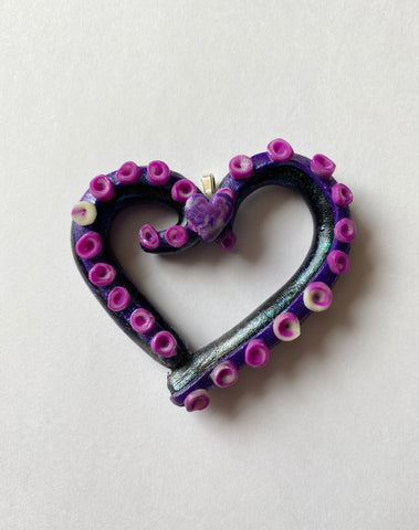 glittery tentacle heart pendant